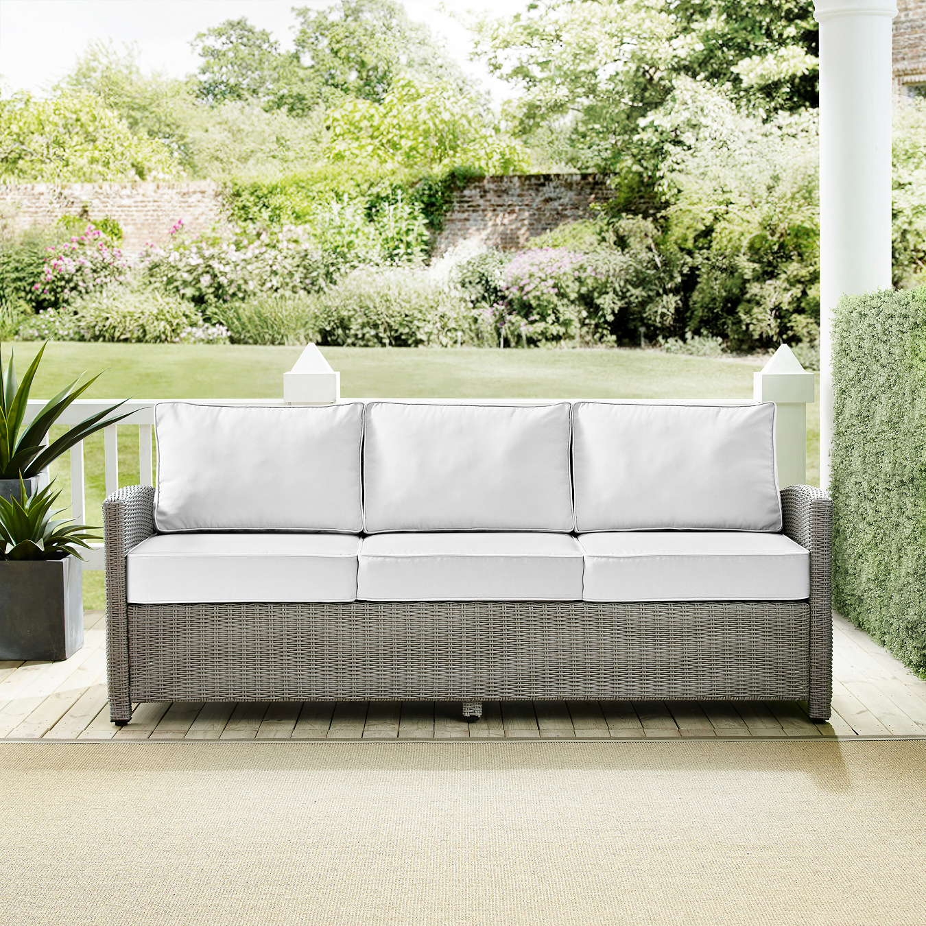 White Wicker Outdoor Sofa P405380